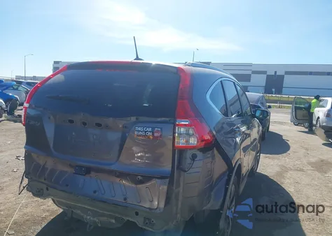 2016 Honda Cr-V Touring z USA, uszkodzony, nr VIN 5J6RM3H92GL031415